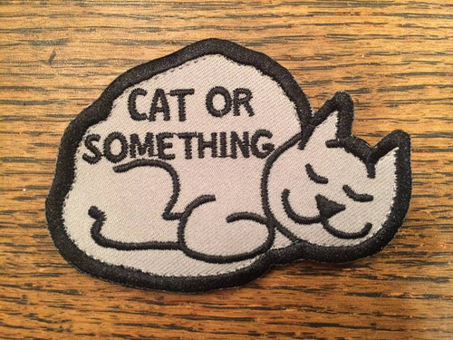 CAT OR SOMETHING